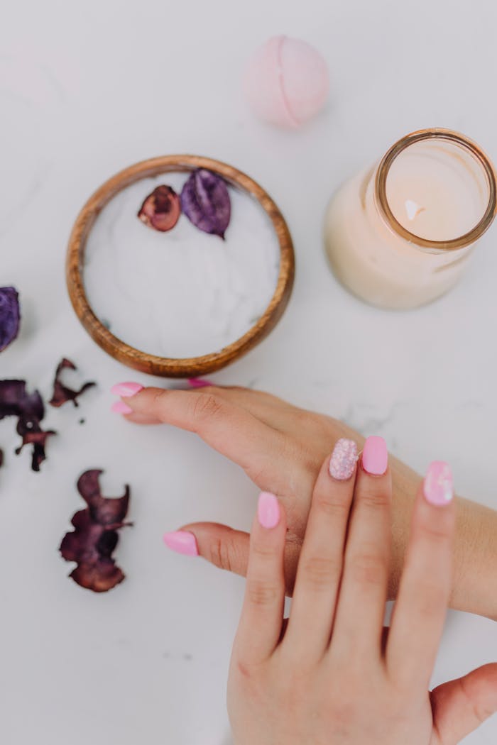 programs-03 Beautiful pink manicure and spa products create a calming and luxurious experience.
